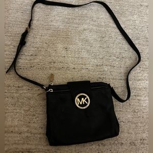 Michael kors crossbody black and gold
